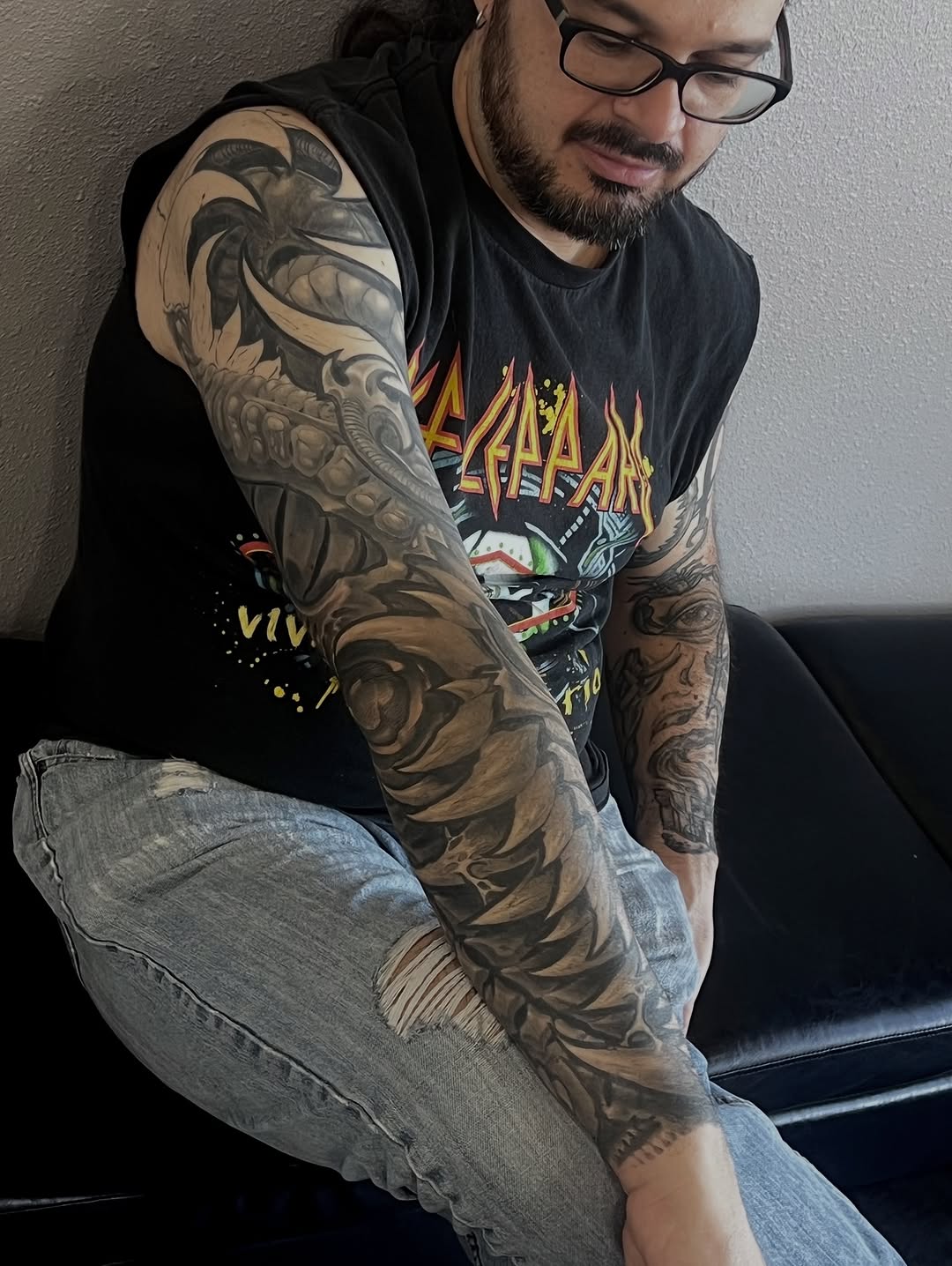 Intricate grayscale biomechanical sleeve with interlocking gears