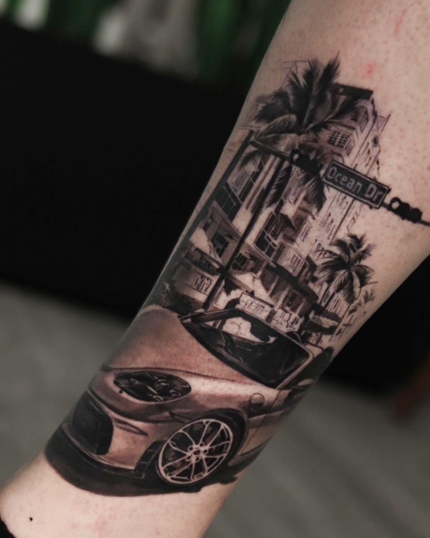 Monochrome Miami street scene with palm trees and car