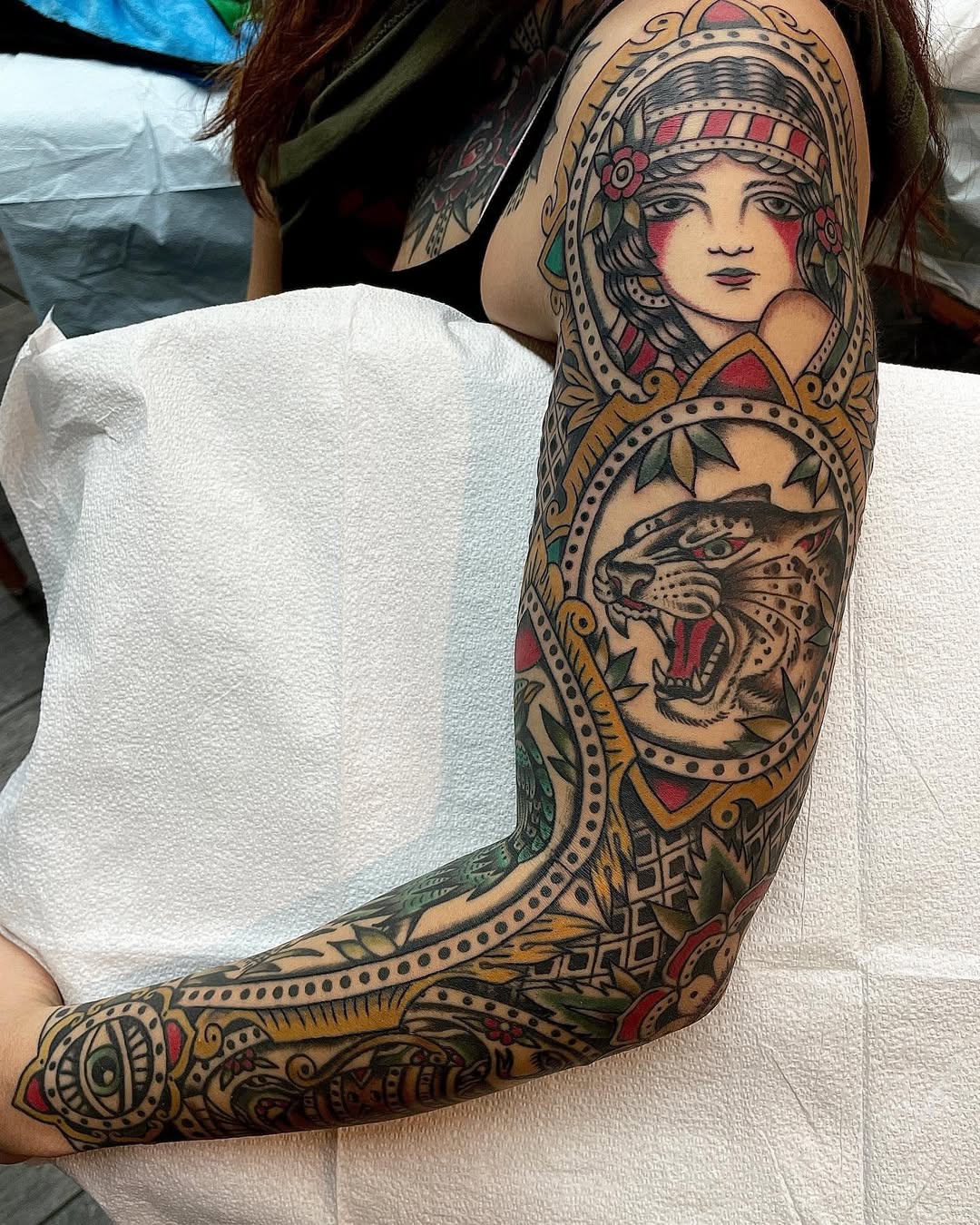 Bold neo-traditional sleeve framed with feminine head and tiger