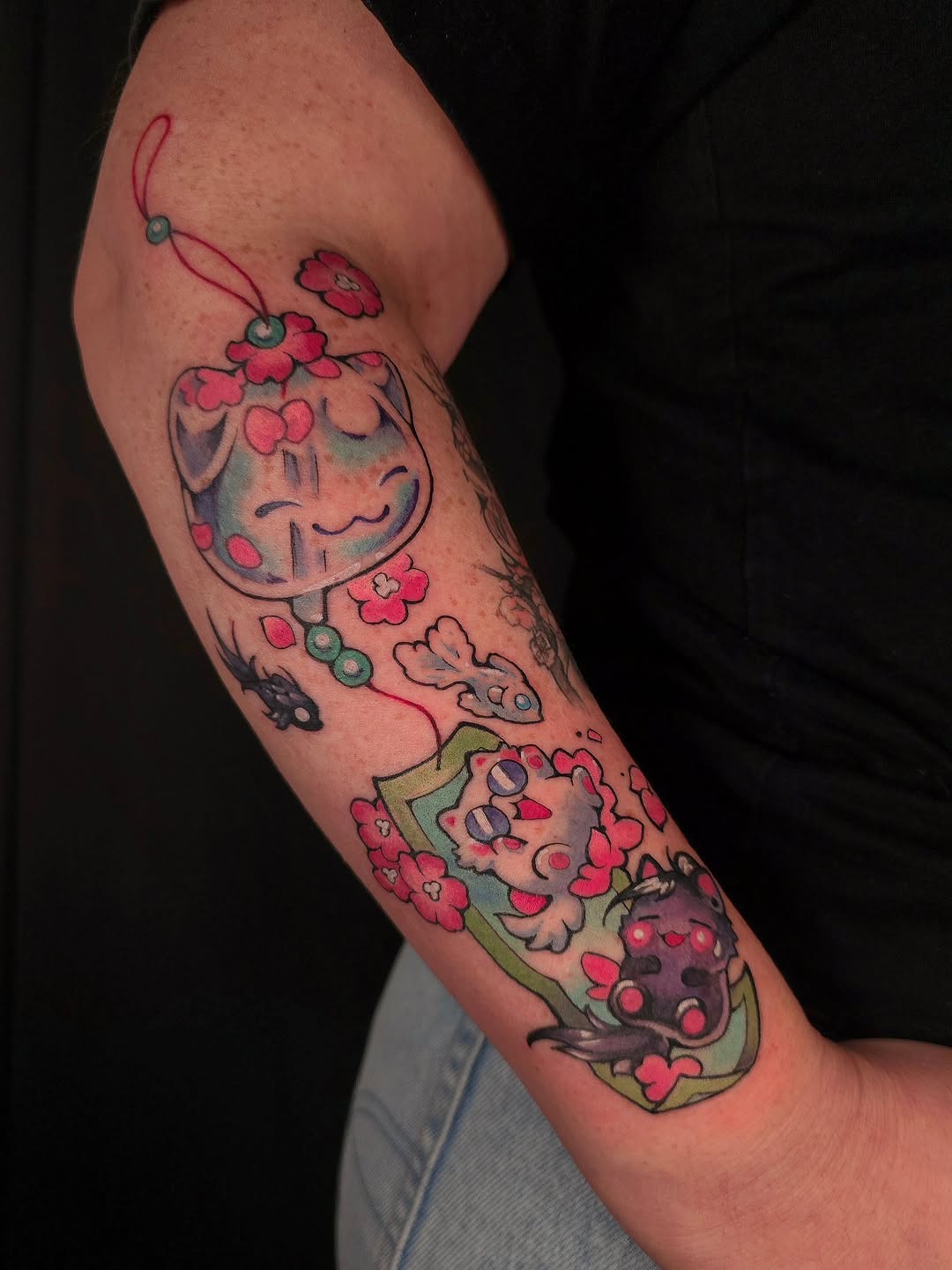 Playful kawaii wind-chime scene with blossoms and fish