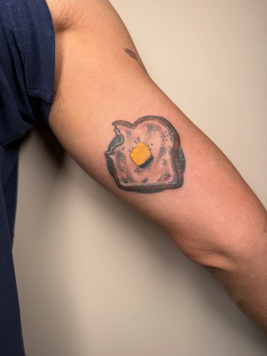 Toast tattoo with butter