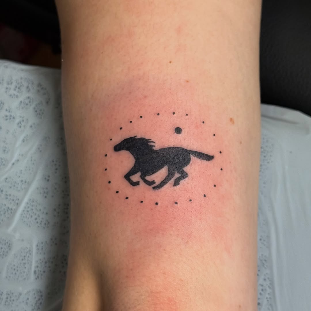 Bold minimalist horse silhouette framed by dotted halo