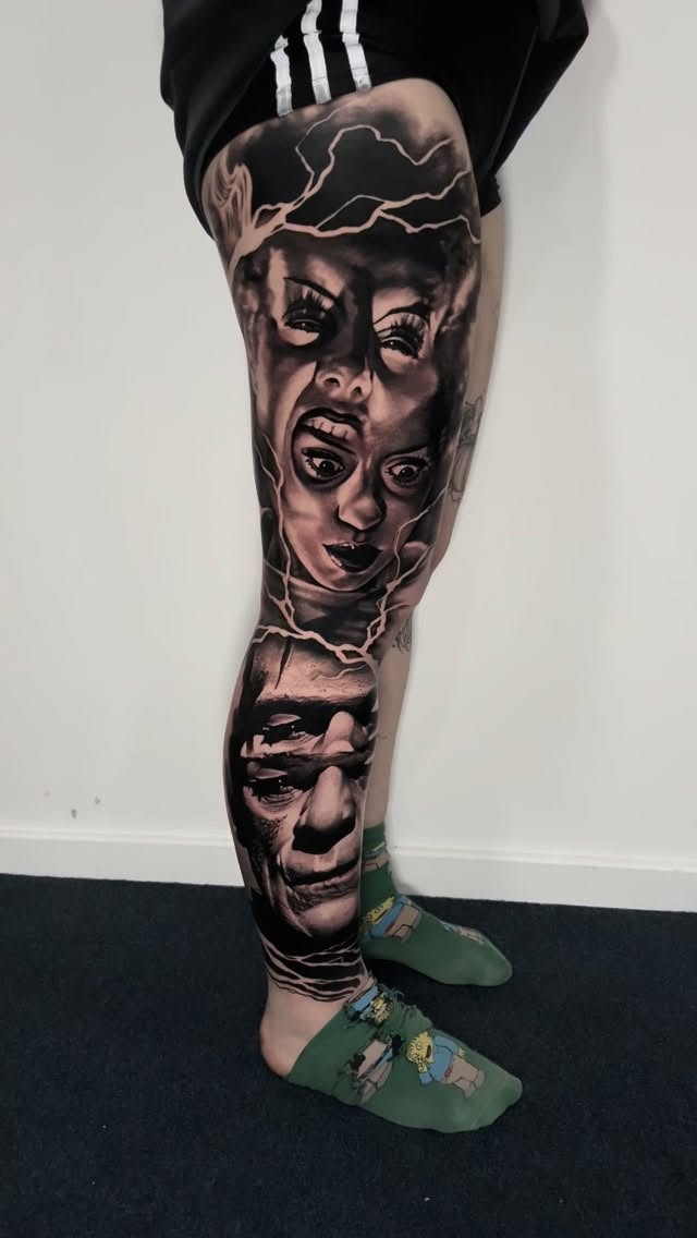 Photorealistic grayscale horror faces wrapped around leg sleeve