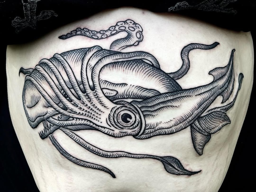 Bold blackwork squid with intricate line shading