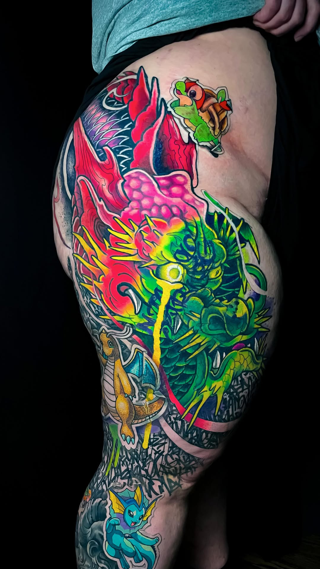 Vibrant neo-traditional dragon sleeve with neon color blocks