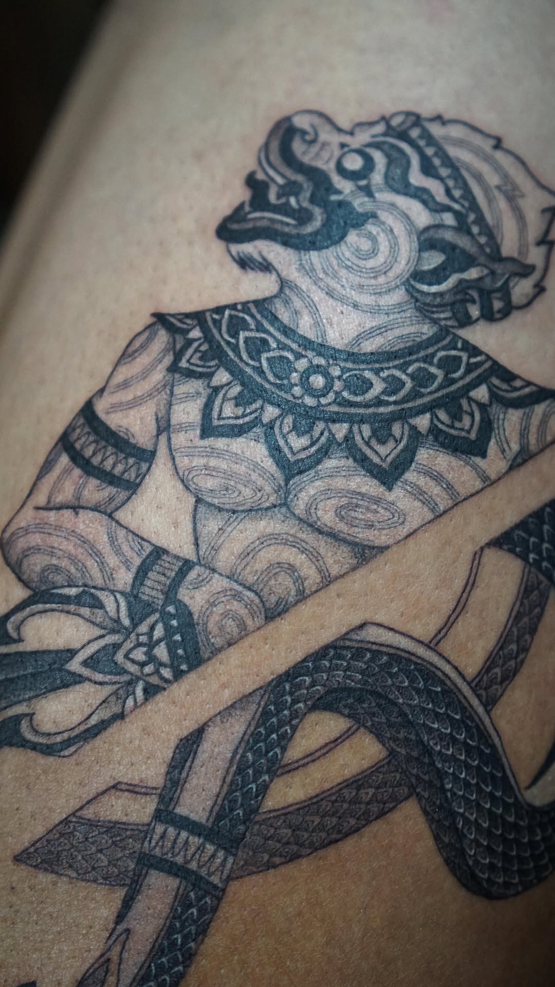 Thai Hanuman warrior with ornate naga-inspired patterns