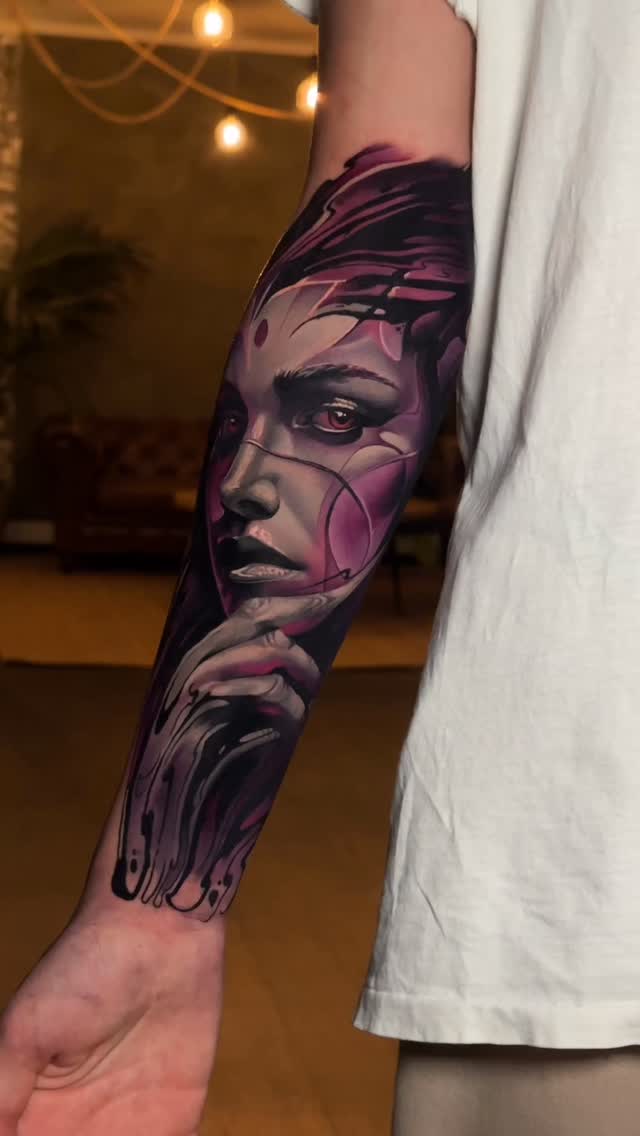 Bold surreal portrait sleeve with violet accents and fluid shading