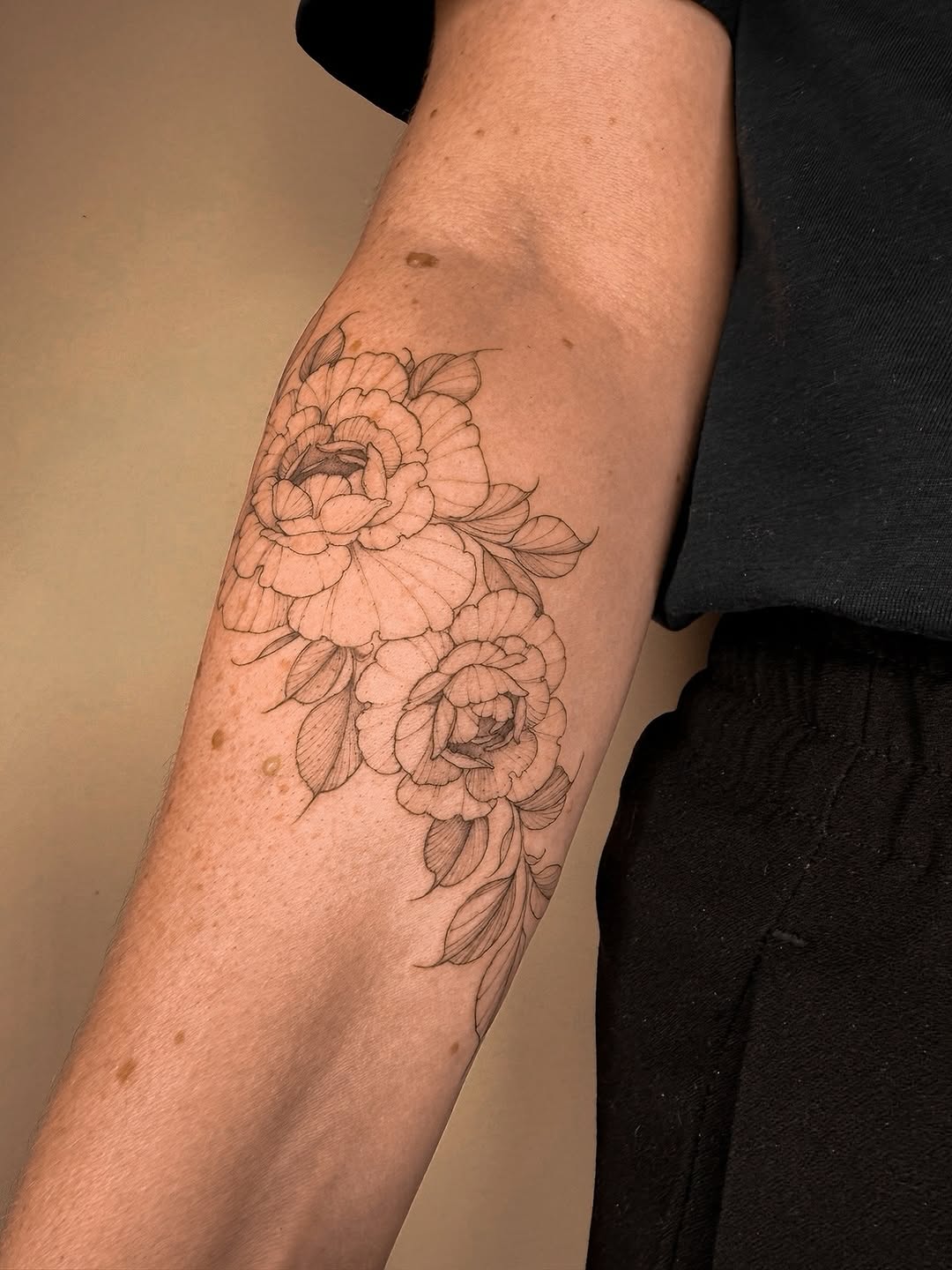 Delicate freehand peony bouquet in fine-line sketch