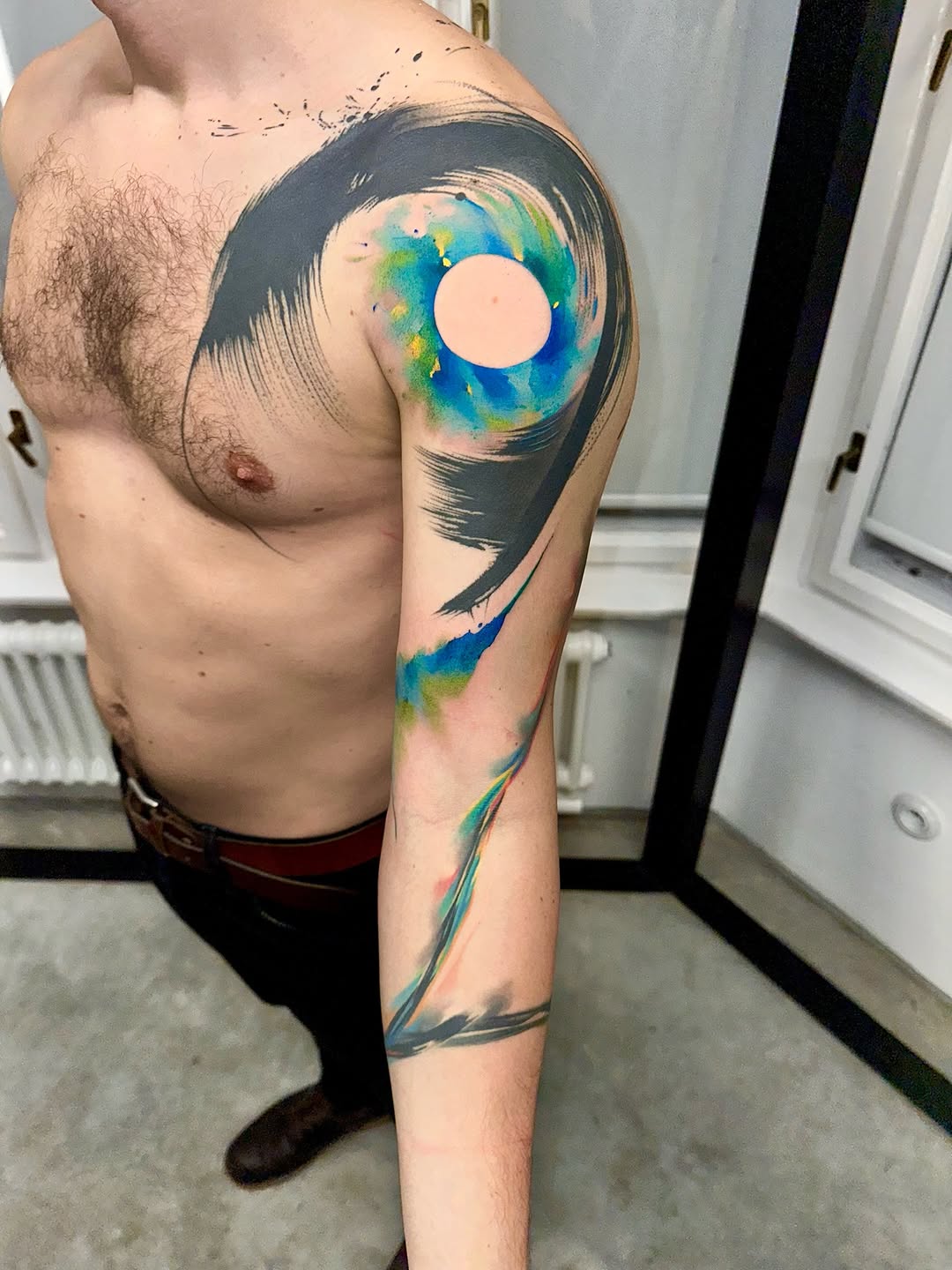 Vibrant watercolor arc with pink sun and bold black swoosh