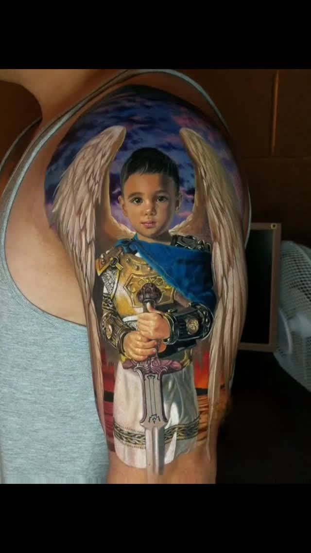 Vibrant fantasy angel in ornate armor with sword and wings