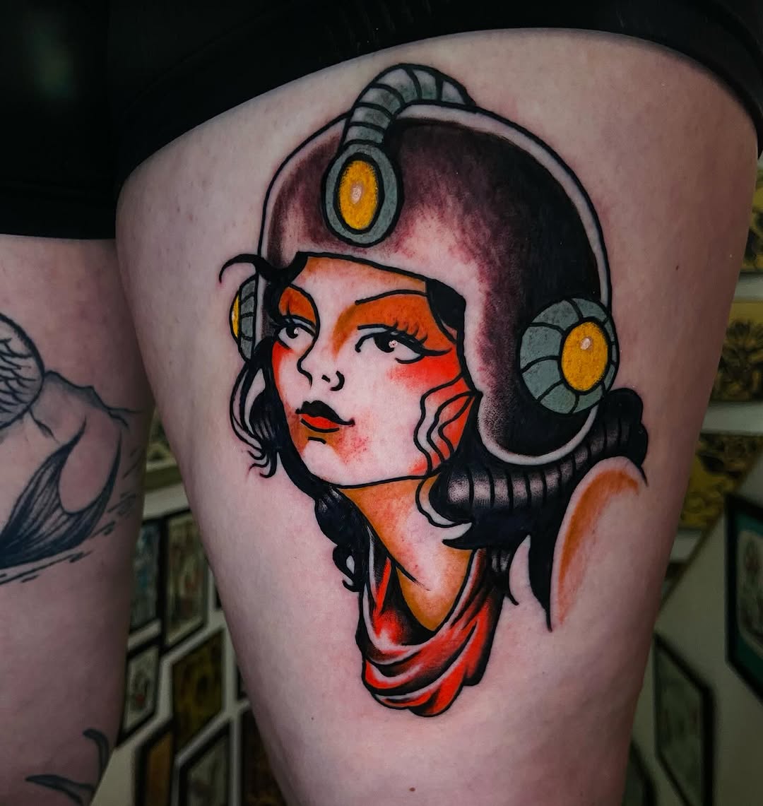 Bold neo-traditional female portrait with retro space helmet.