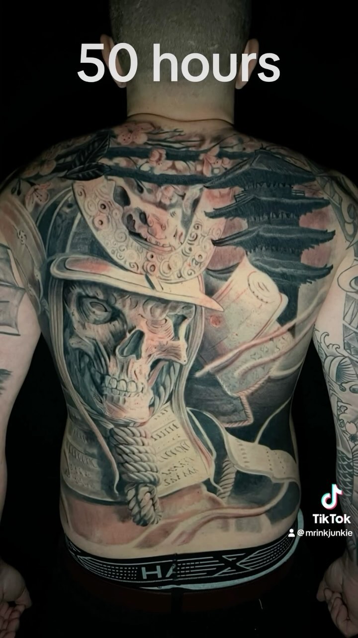 Bold grayscale back piece with skull and pagoda