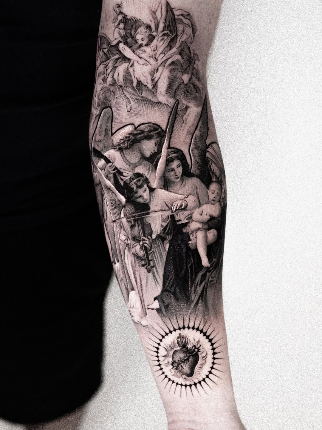 Angelic figures with heart