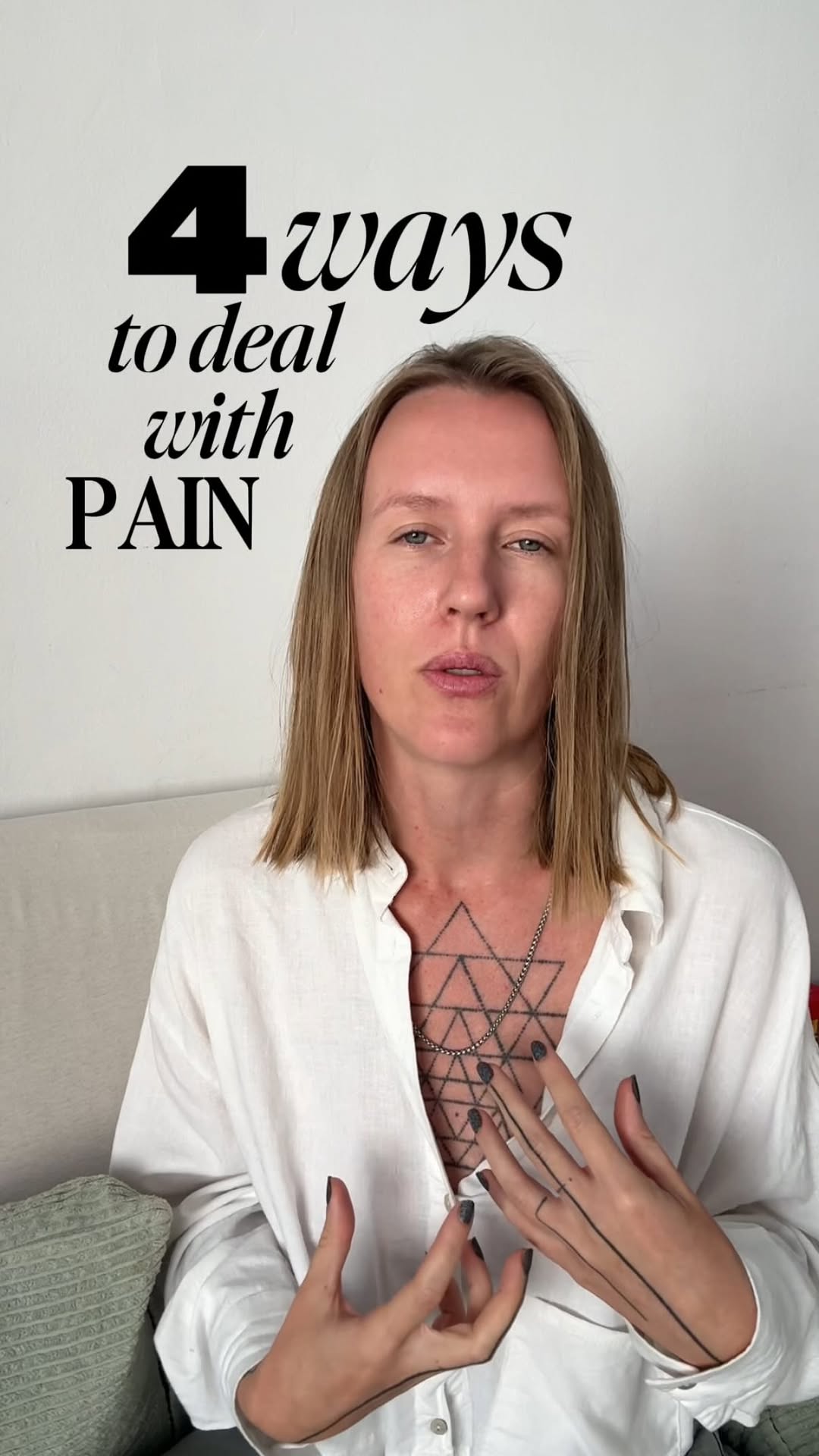 Intricate geometric chest tattoo of interlocking triangles