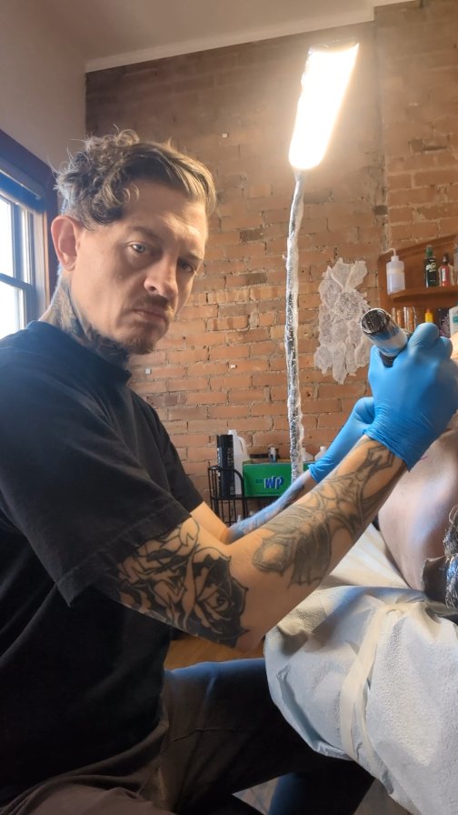 Bold blackwork rose with thick outlines and shading