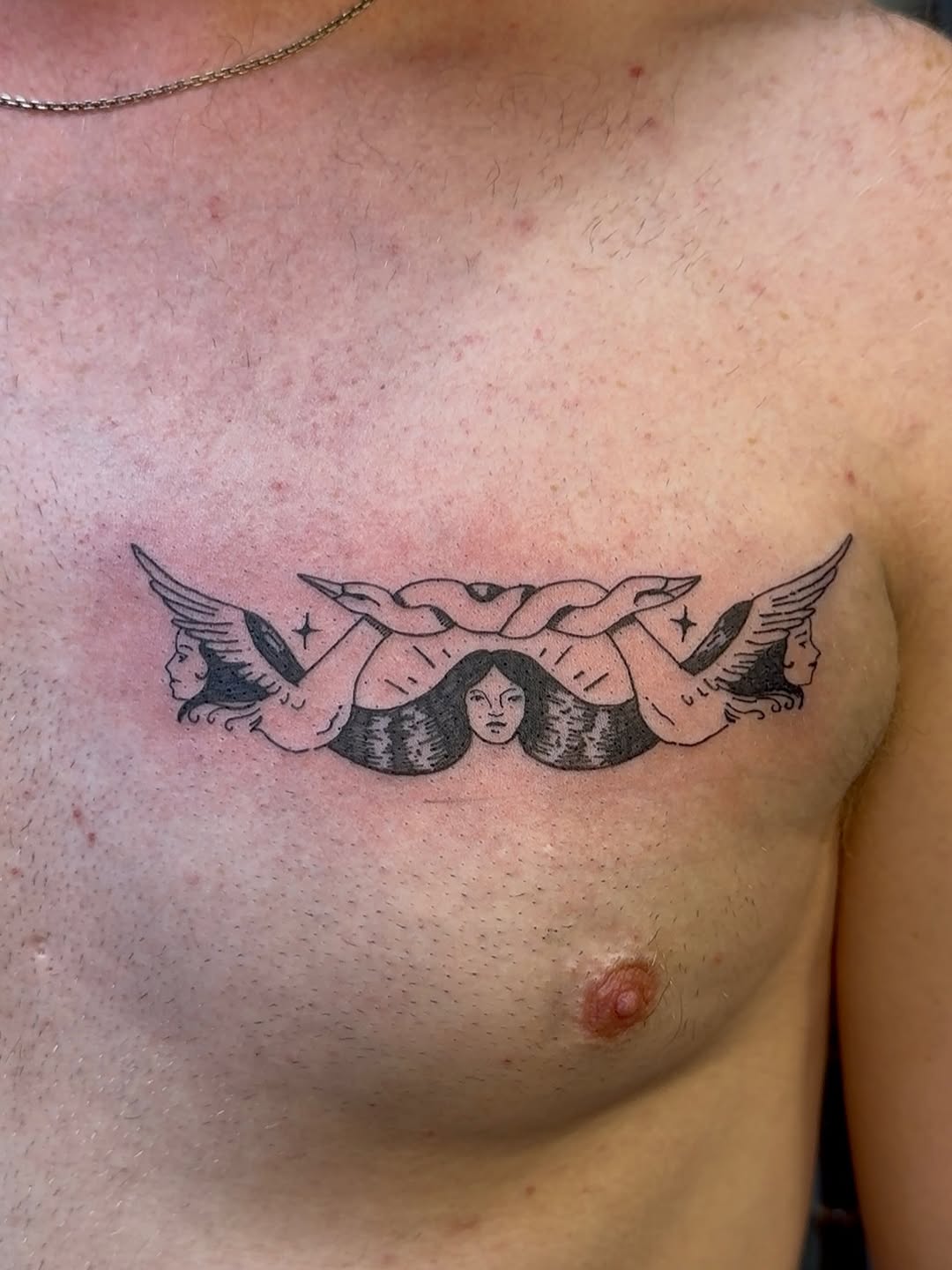 Whimsical winged women ensemble with central serene face