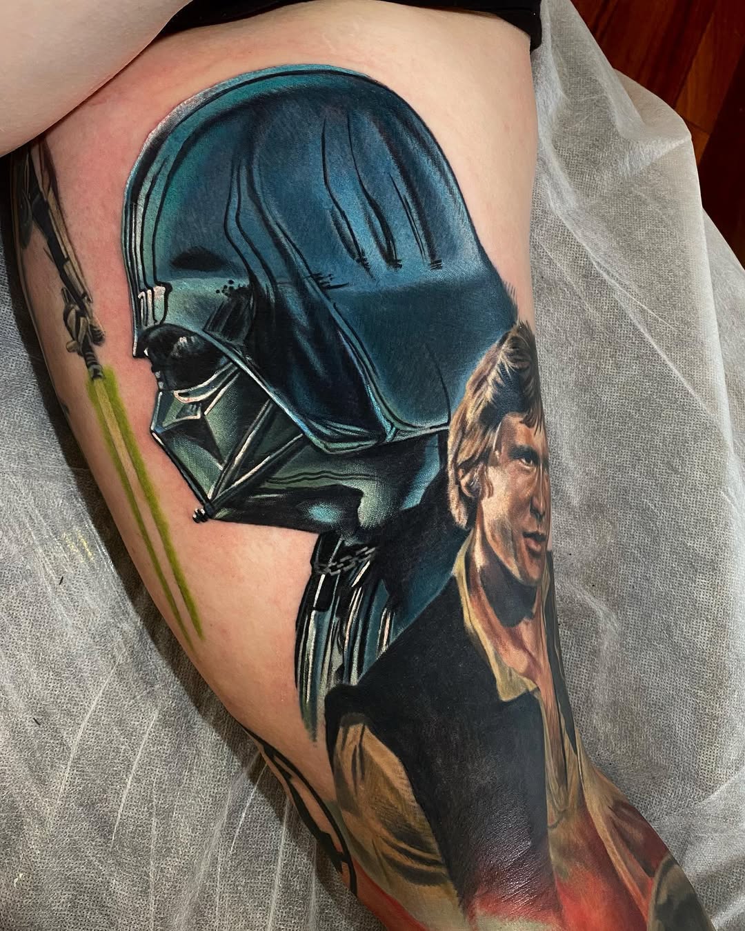 Hyper-detailed Vader helmet with lifelike Han Solo portrait