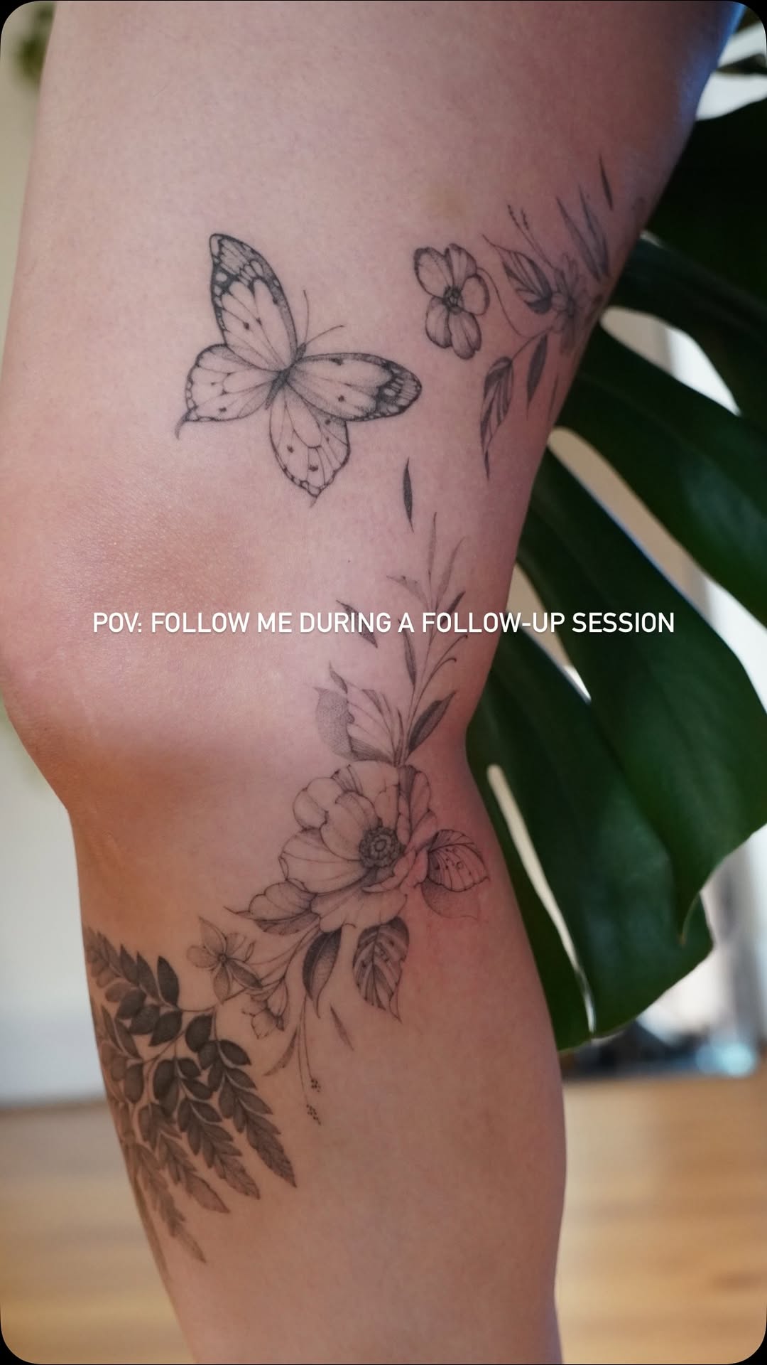 Fine-line floral leg piece with butterfly accents.