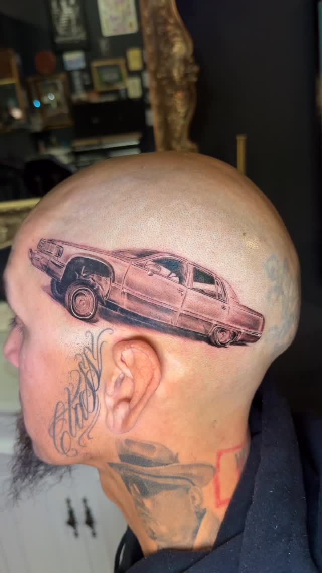 Hyper-detailed black-and-gray vintage car across the scalp