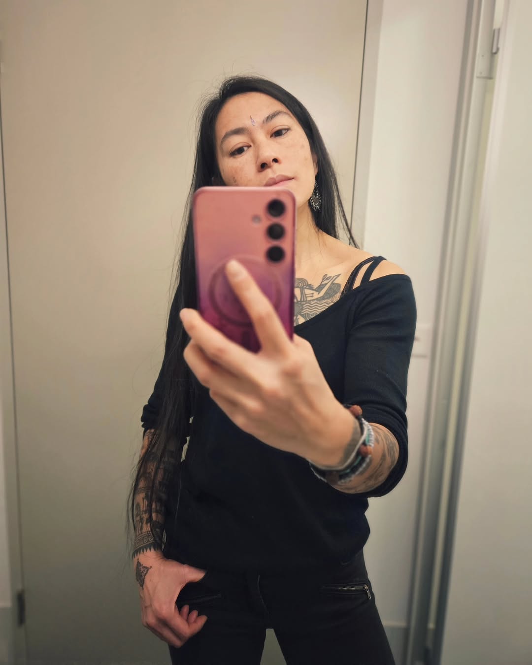 Bold blackwork geometric forearm sleeve with collarbone ornament