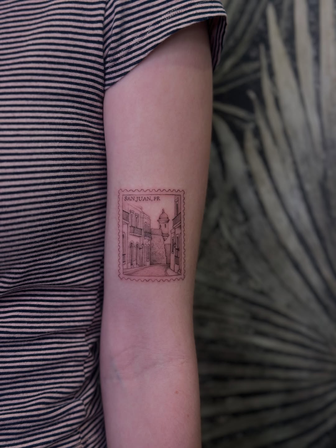 Delicate fine-line stamp-style cityscape of San Juan