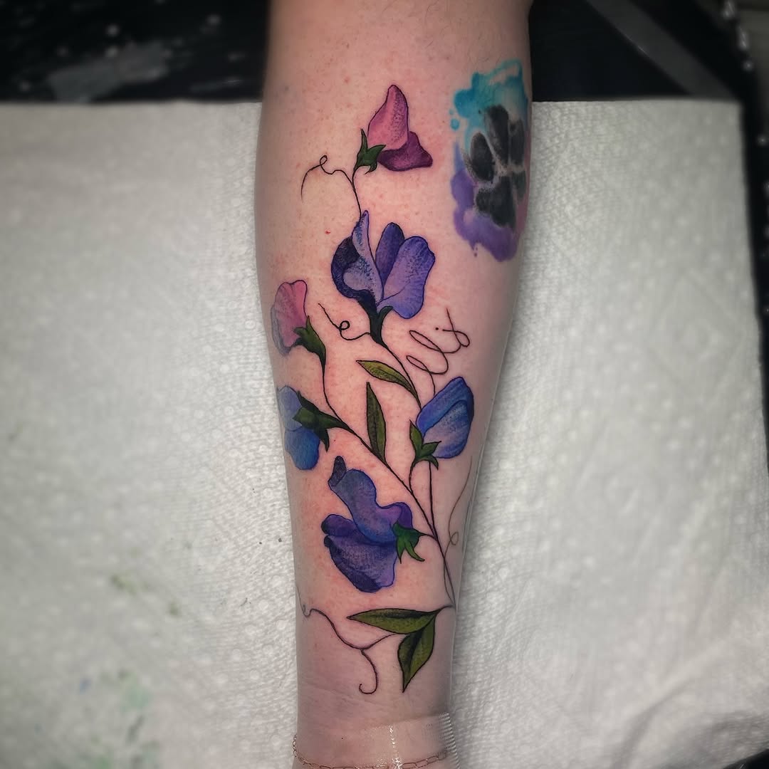 Pastel watercolor sweet pea bouquet with initial tendrils