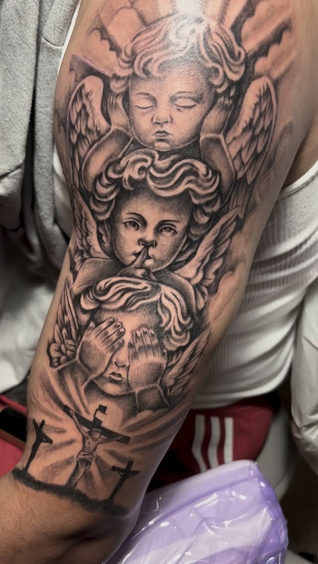 Monochrome cherubs with wings, serene and layered