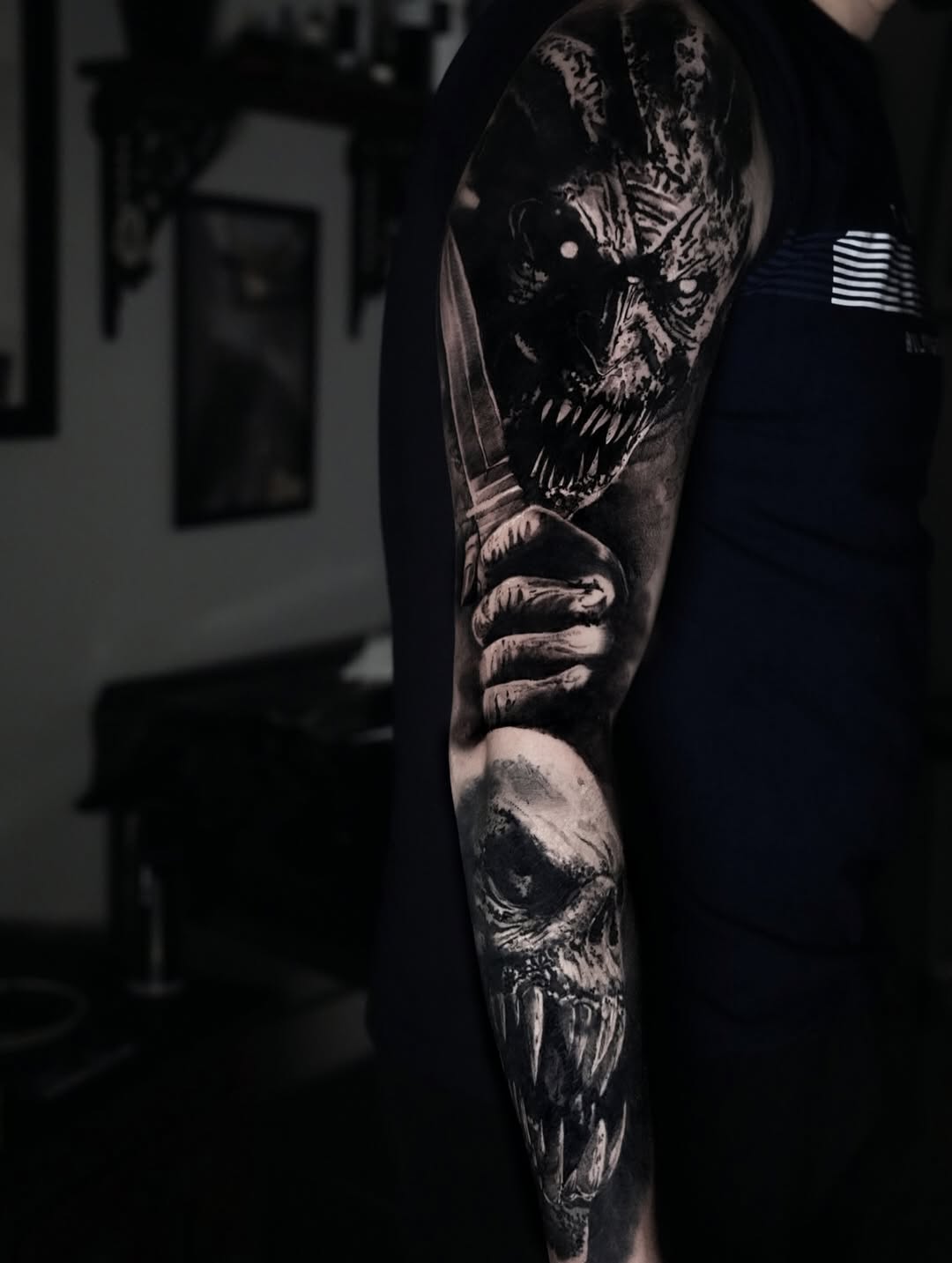Monstrous horror forearm sleeve with snarling demon