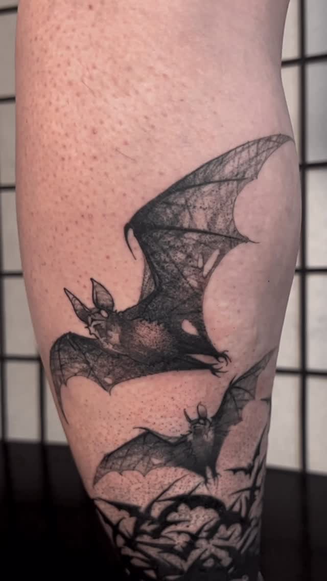 Flock of gothic bats in dramatic black silhouettes