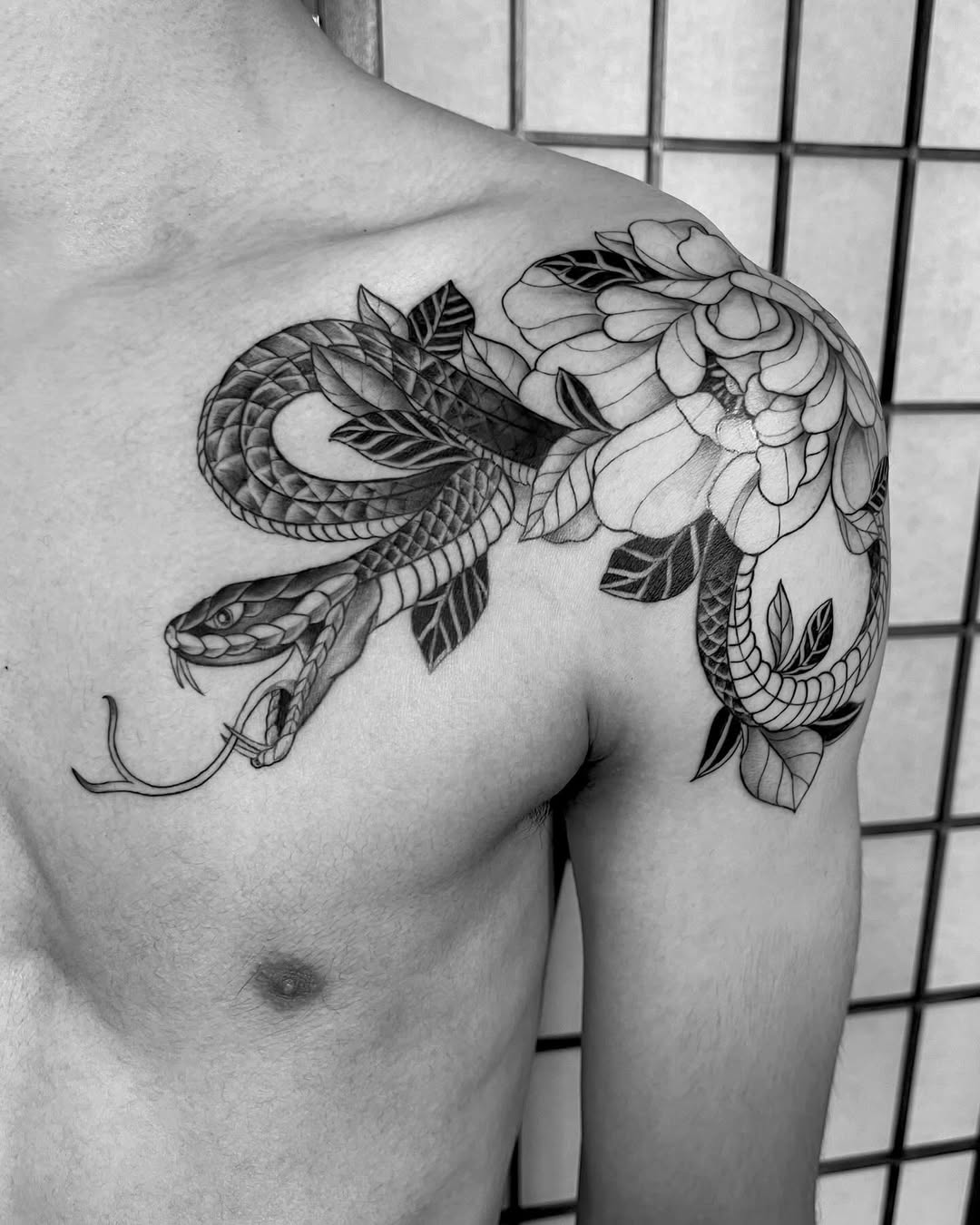 Snake and peony tattoo
