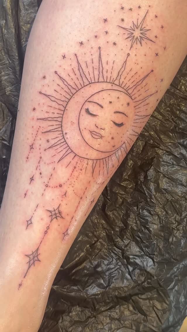 Delicate sun and moon celestial motif in fine lines