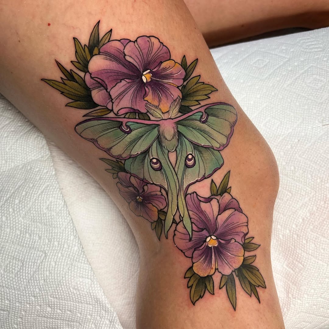 Vibrant luna moth with lavender pansies, bold linework