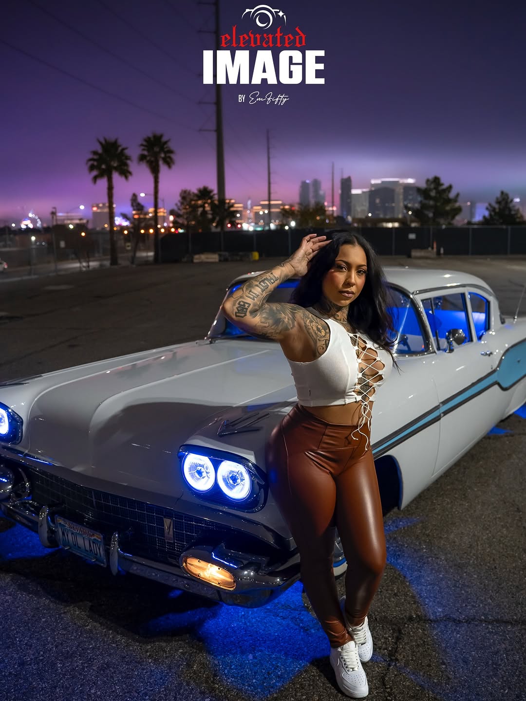 Bold black-and-gray sleeve tattoos on confident model