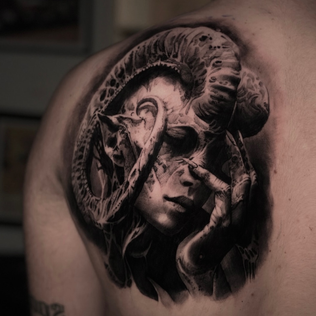 Surreal grayscale portrait entwined by a curling serpent