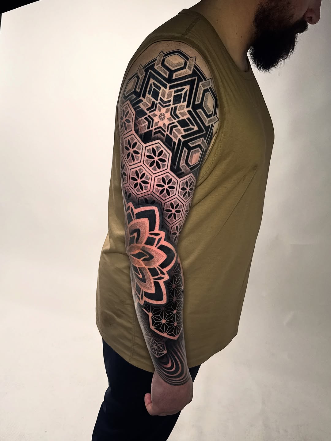 Intricate geometric full-sleeve with tessellated hex patterns