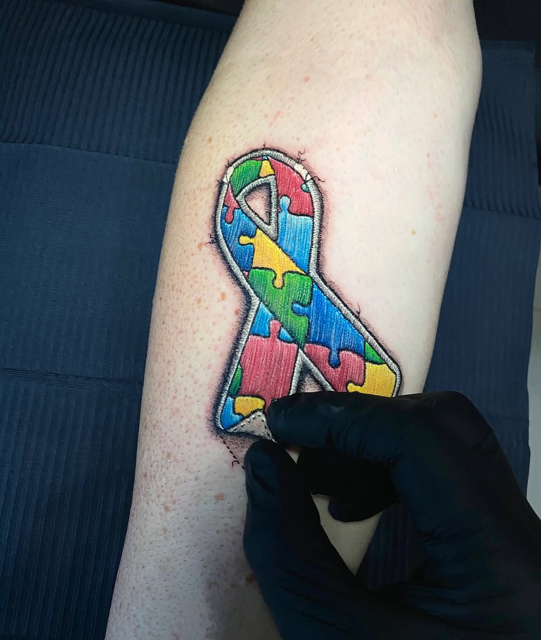 Vibrant puzzle-piece ribbon with bold outlines.