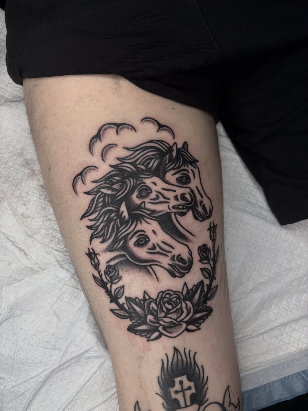 Bold blackwork horses heads entwined with roses