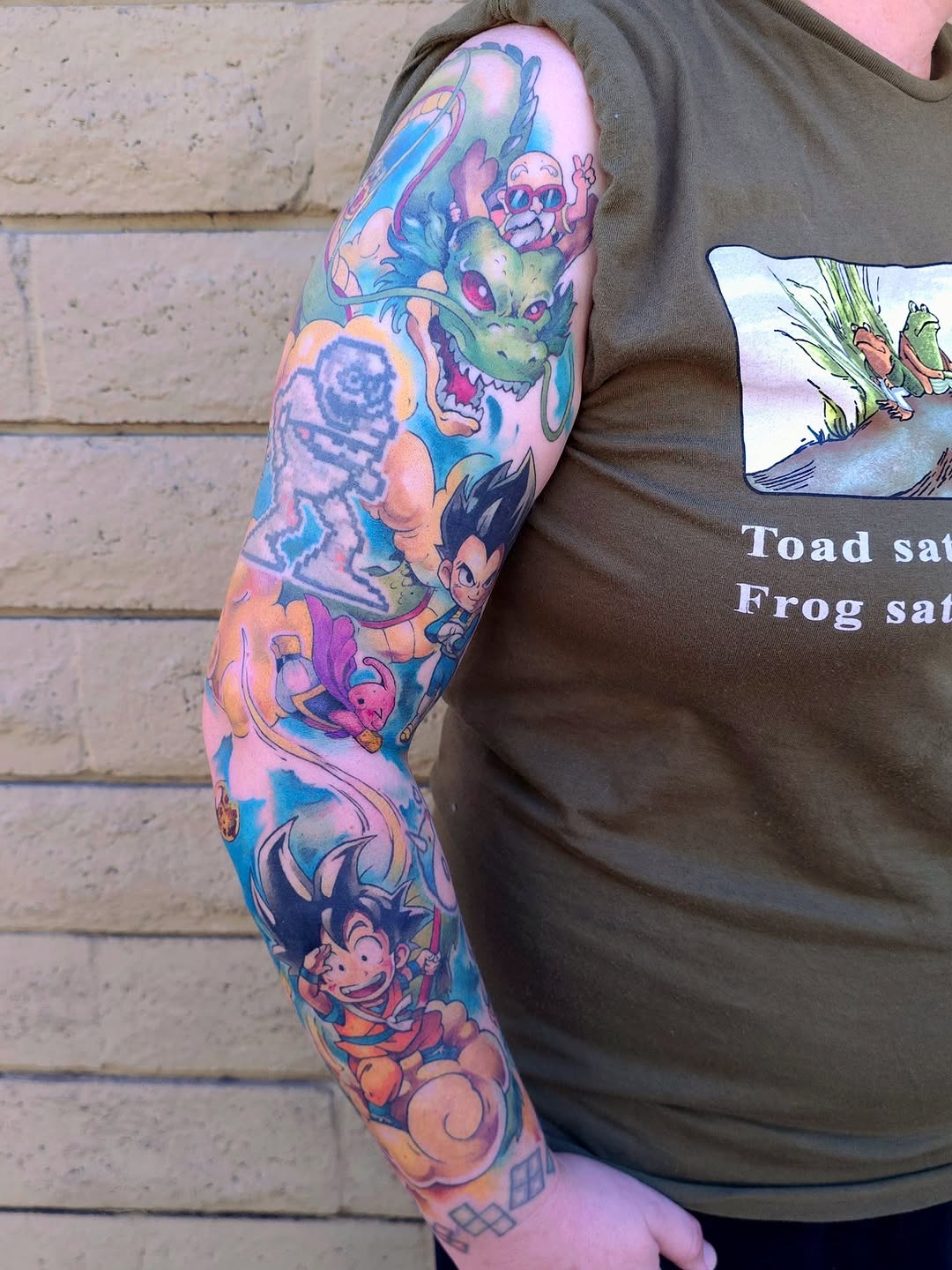 Vibrant Dragon Ball anime sleeve with chibi heroes