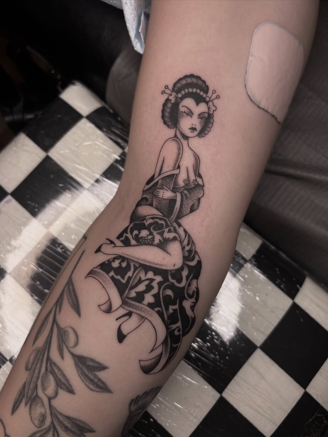 Geisha figure in elaborate kimono with bold linework