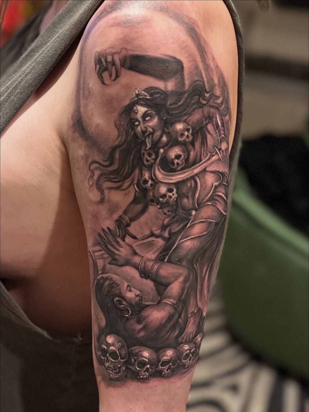 Intense black-and-gray Kali goddess with skull necklace