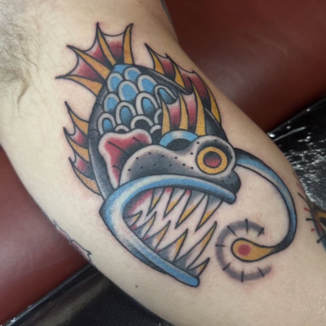 Bold neo-traditional dragon-koi with fiery fins.