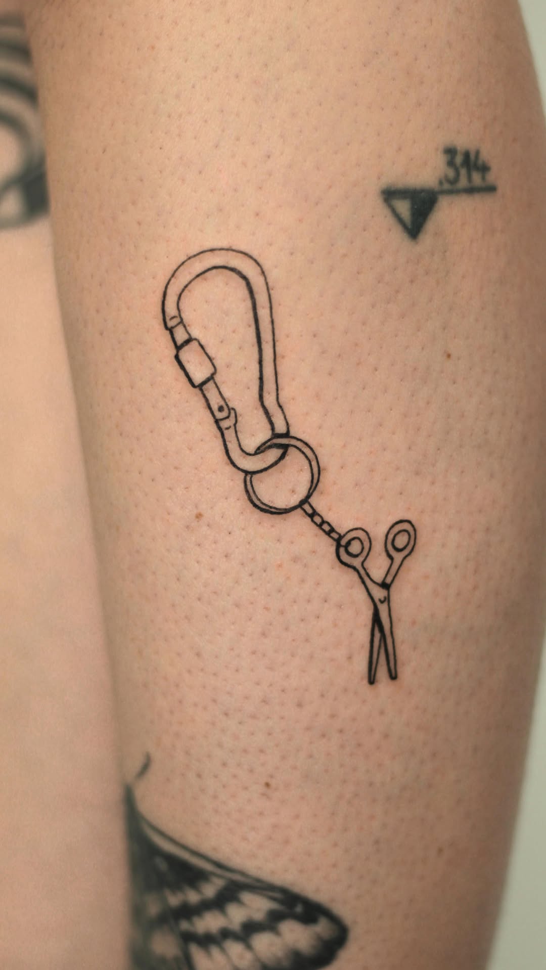 Delicate fineline carabiner with scissors tattoo, minimalist