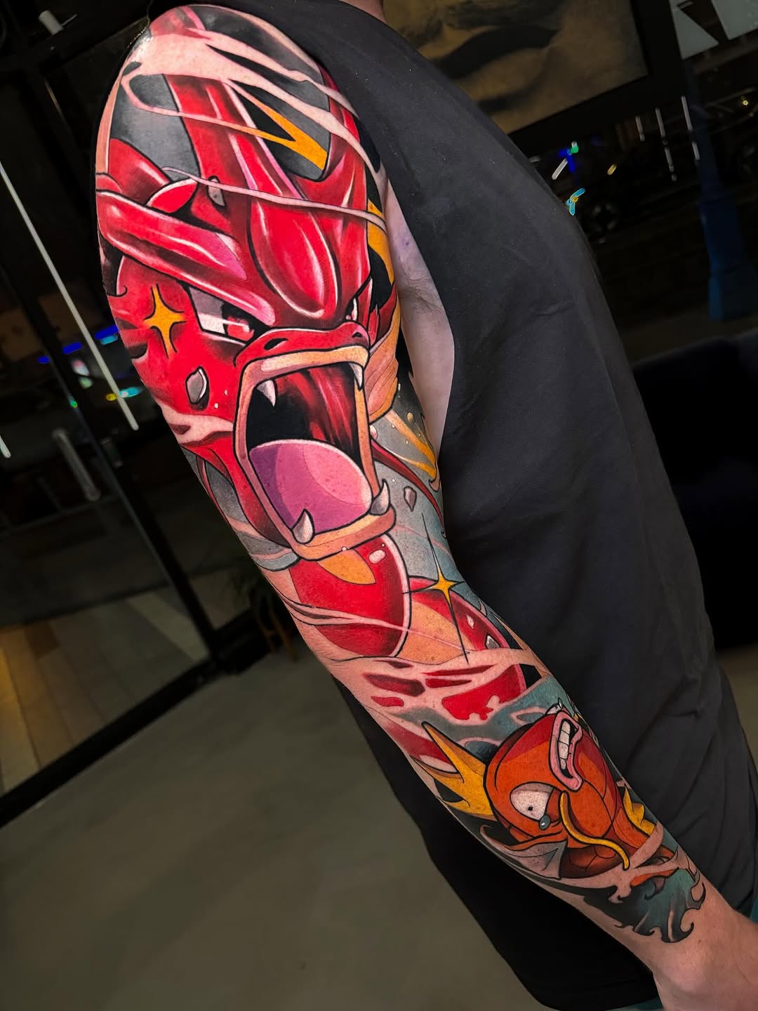 Colorful Gyarados and Magikarp tattoo