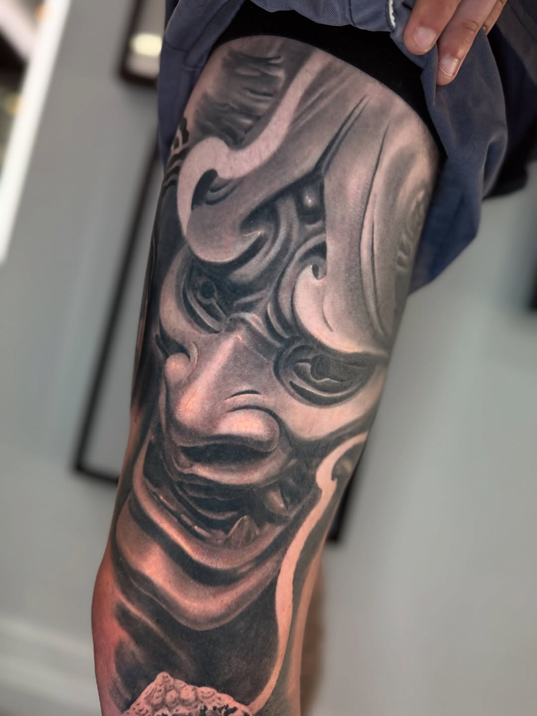 Monochrome Buddha and Hannya mask with flowing shading