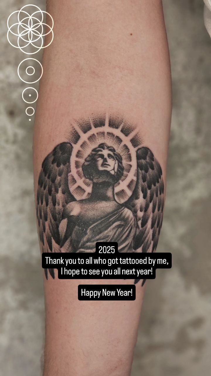 Monochrome angel with feathered wings and radiant halo