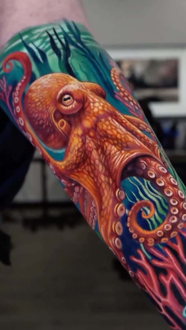 Vibrant octopus cover-up tattoo