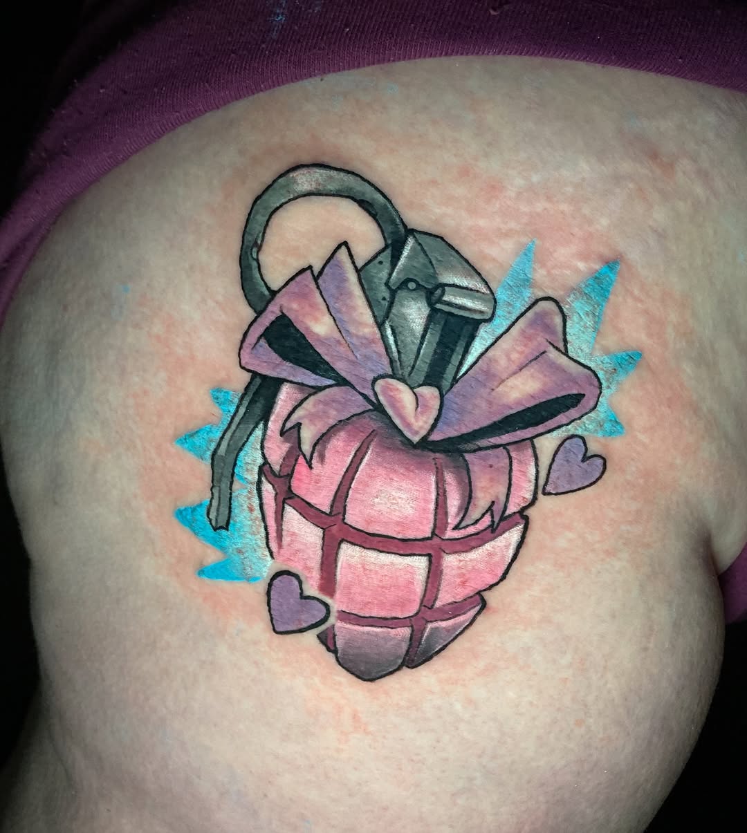 Whimsical heart-shaped grenade with pastel petals and hearts