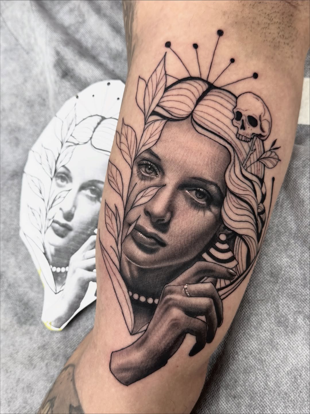 Hyper-realistic female portrait with leafy halo and skull