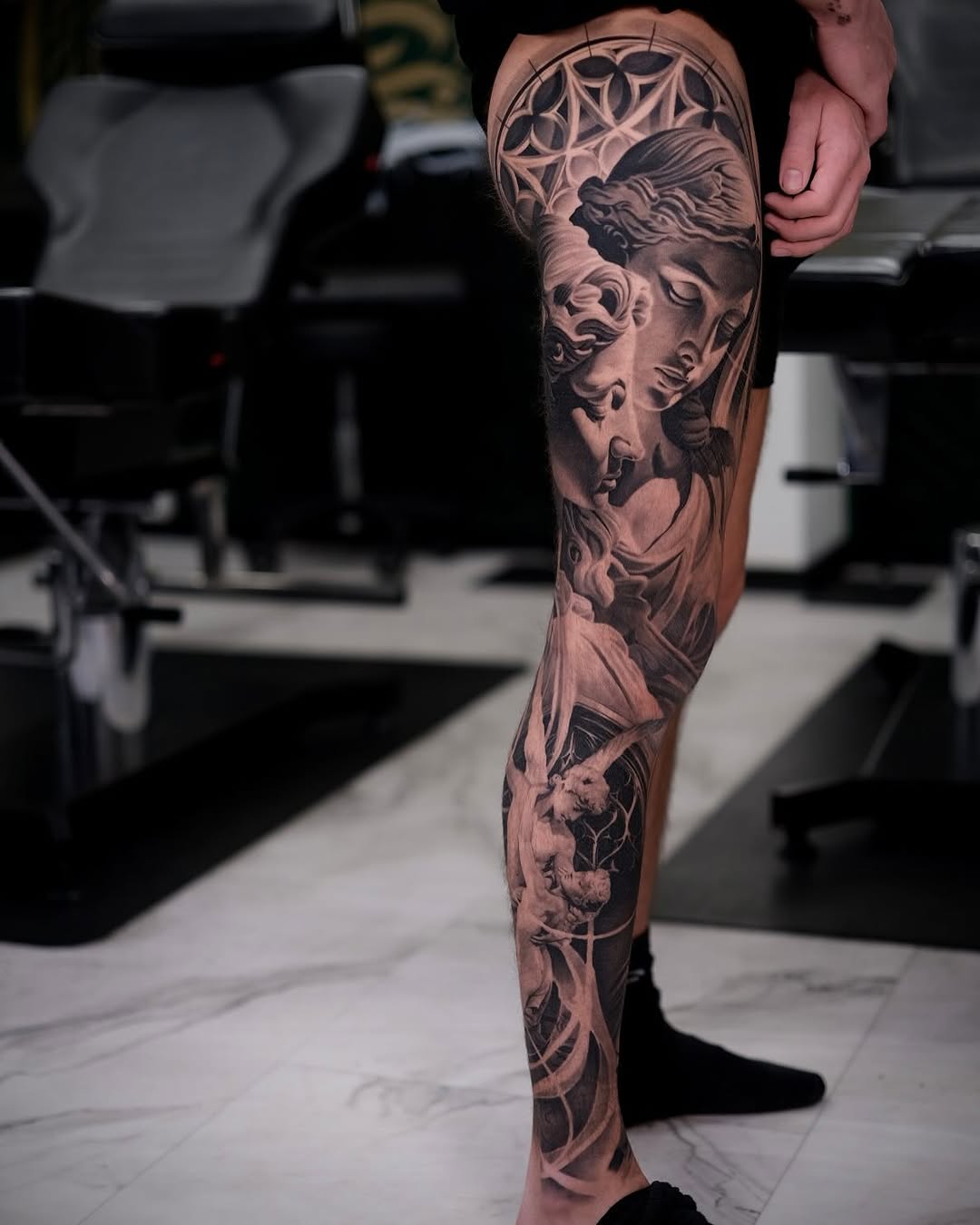 Grayscale goddess portrait with geometric halo