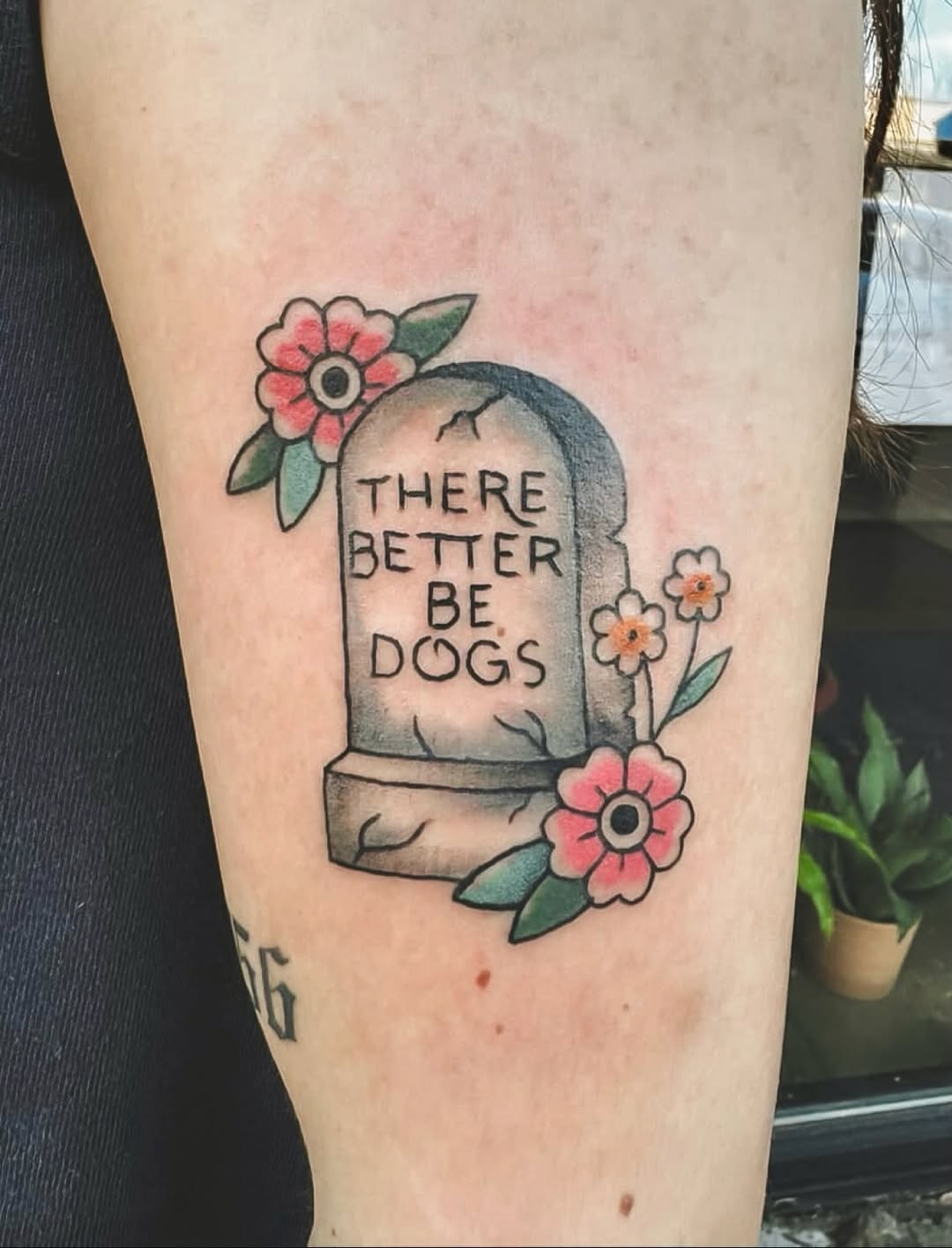 Cartoon-style tombstone with pink flowers and bold outlines